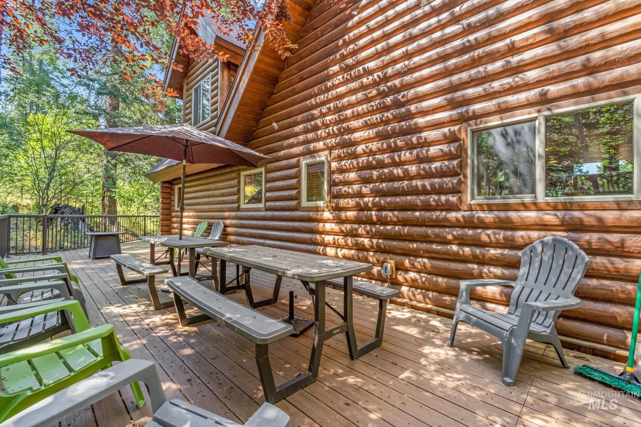 1160 Bell Flower Place McCall, ID 83638 - Photo 39 of 45 Wooden terrace with outdoor dining space