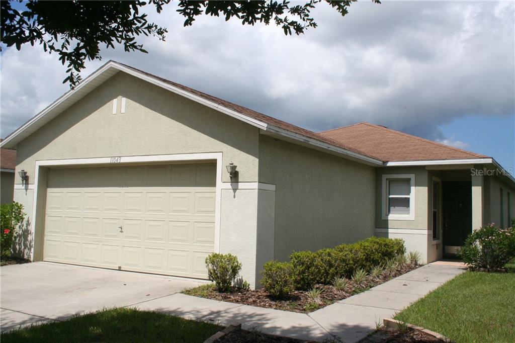 11043 Golden Silence Drive Riverview, FL 33579 - Photo 1 of 1 a front view of house with yard