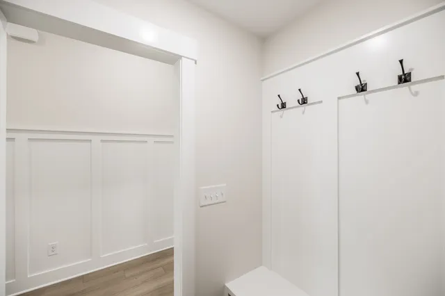 a bathroom with a shower and toilet