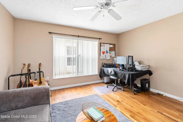 a workspace with furniture and a window