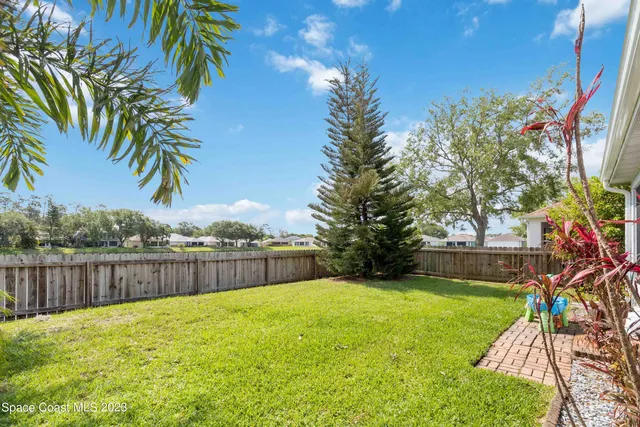 a view of a backyard with a garden