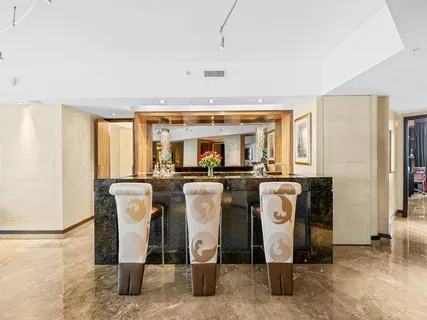 a room with multiple dryer and washer