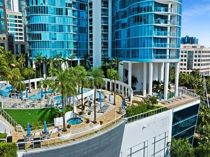 a view of a tall building from a patio