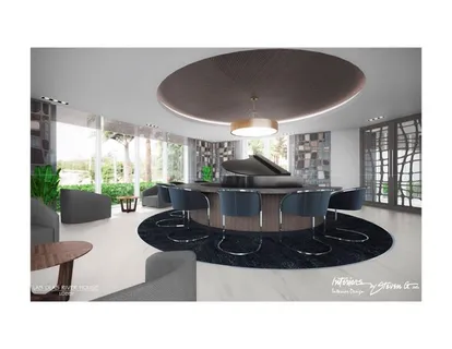 a living room with furniture and view of kitchen