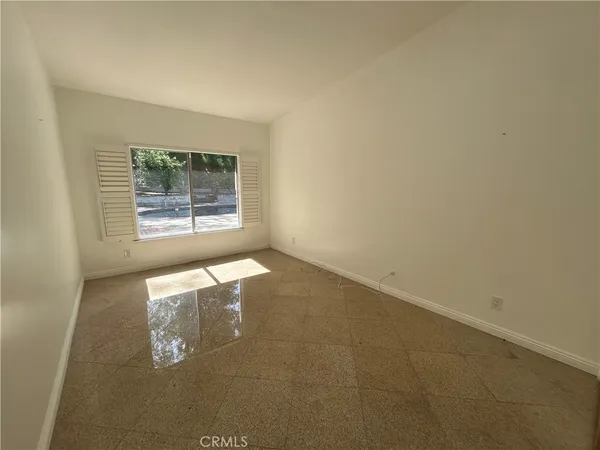 a view of a tree with an outdoor space