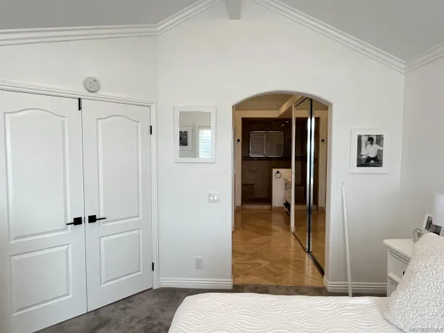 a bathroom with double vanity sink and mirror