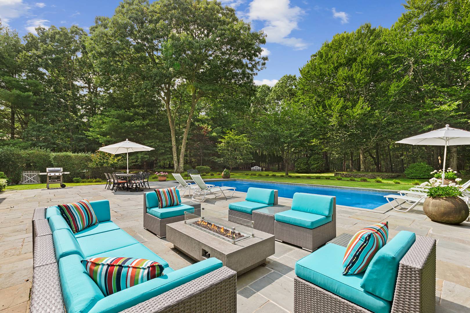 33 Cedar Trail East Hampton, NY 11937 - Photo 2 of 30 a view of an outdoor sitting area with furniture