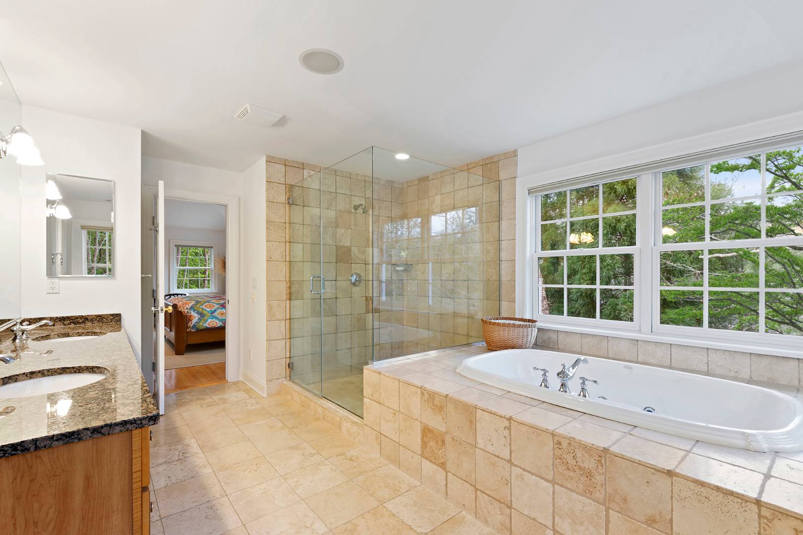 33 Cedar Trail East Hampton, NY 11937 - Photo 20 of 30 a bathroom with a tub a sink a mirror and a shower