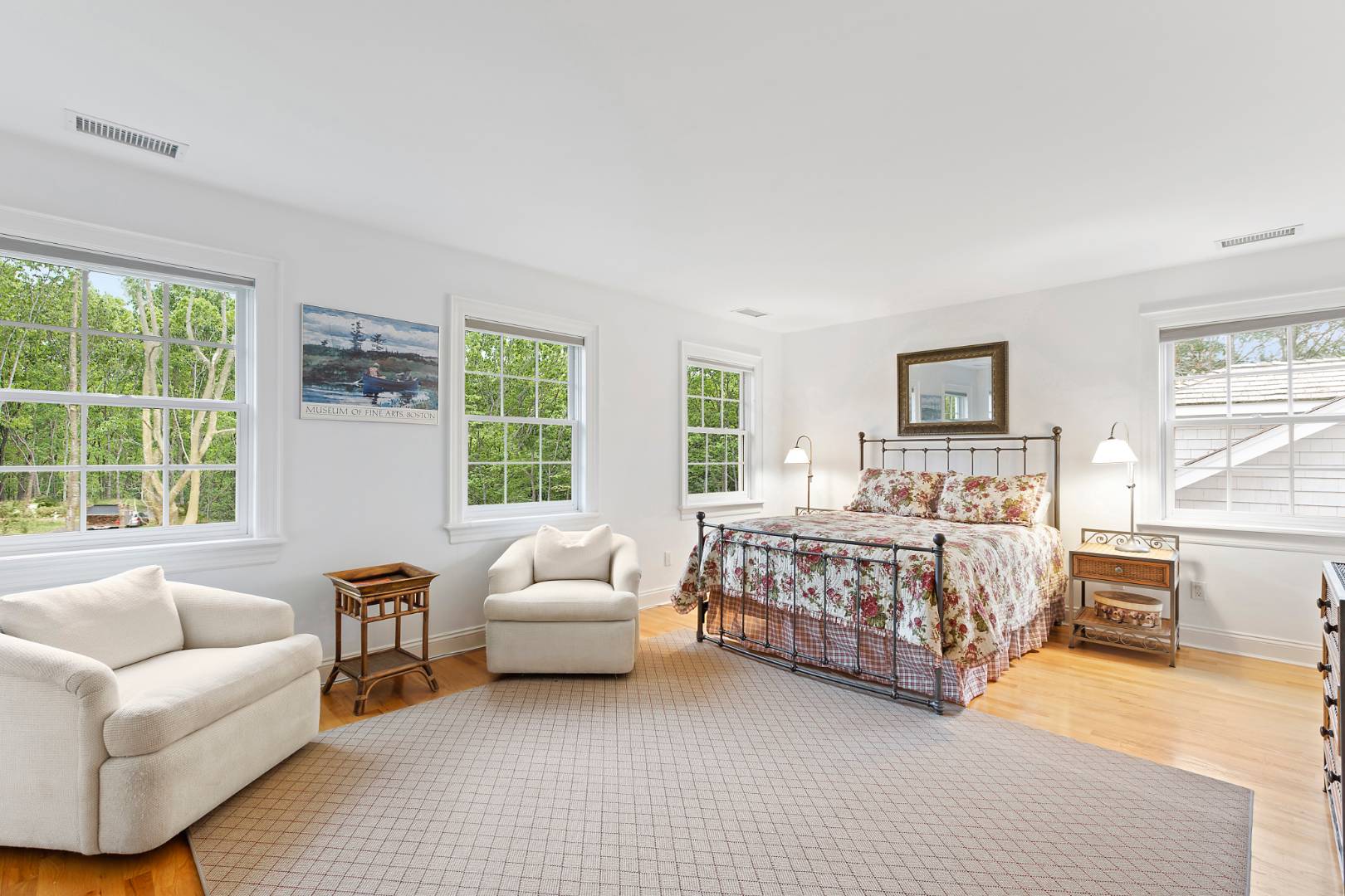 33 Cedar Trail East Hampton, NY 11937 - Photo 21 of 30 a bedroom with a bed and a couch with window