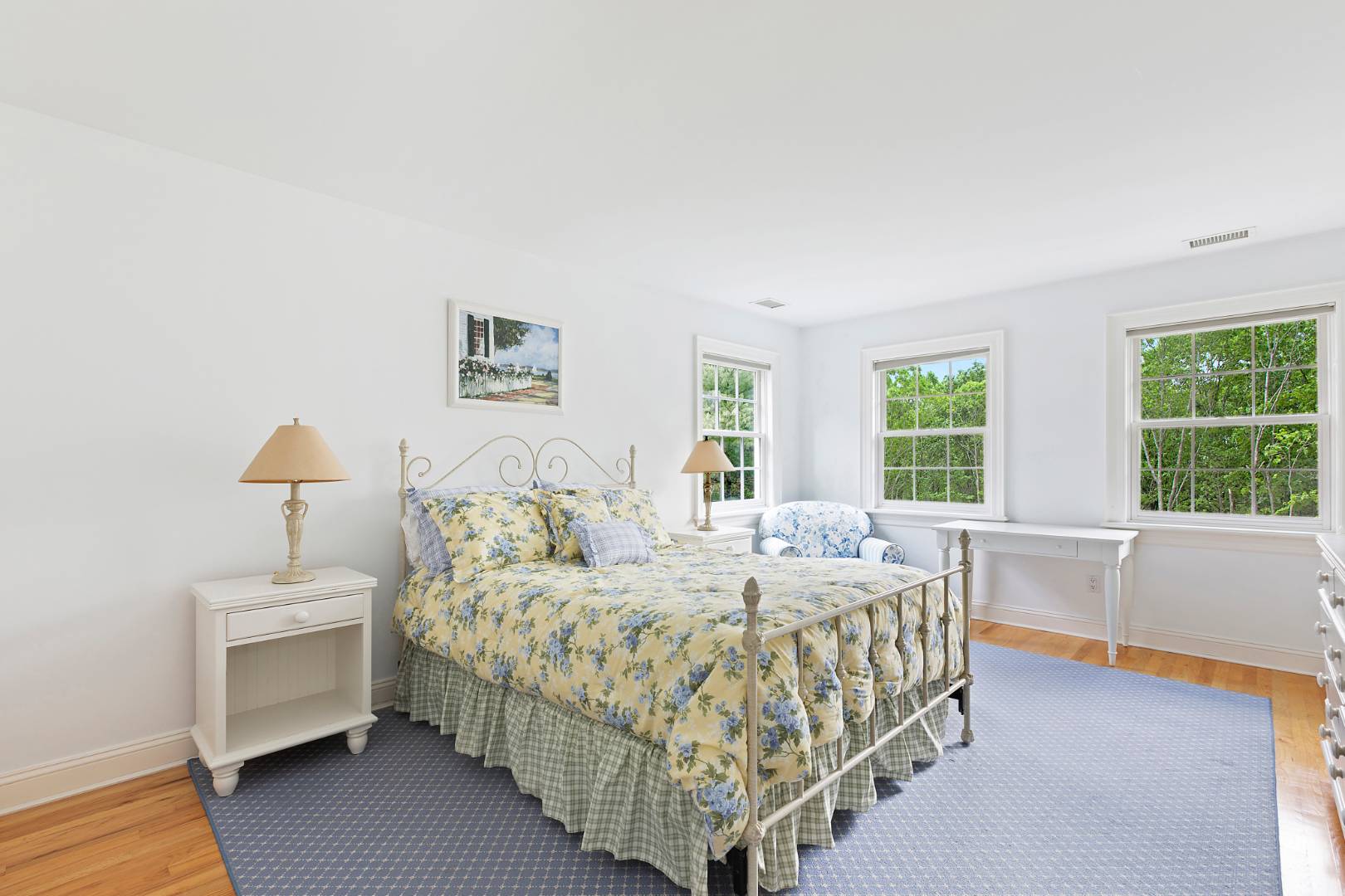 33 Cedar Trail East Hampton, NY 11937 - Photo 25 of 30 a bedroom with a bed and a table