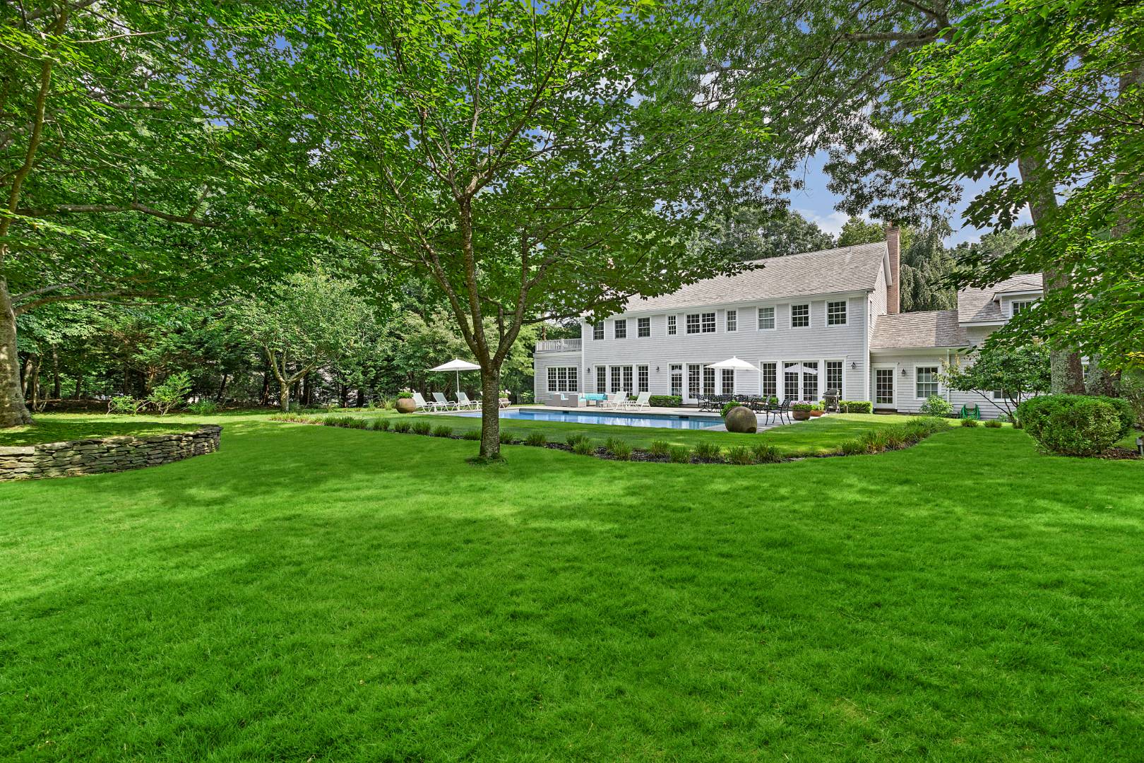 33 Cedar Trail East Hampton, NY 11937 - Photo 28 of 30 a view of a house with a big yard