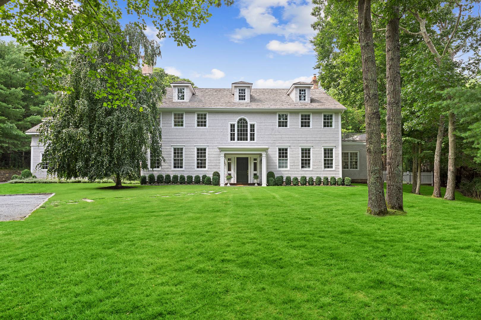 33 Cedar Trail East Hampton, NY 11937 - Photo 4 of 30 a view of a house with a big yard