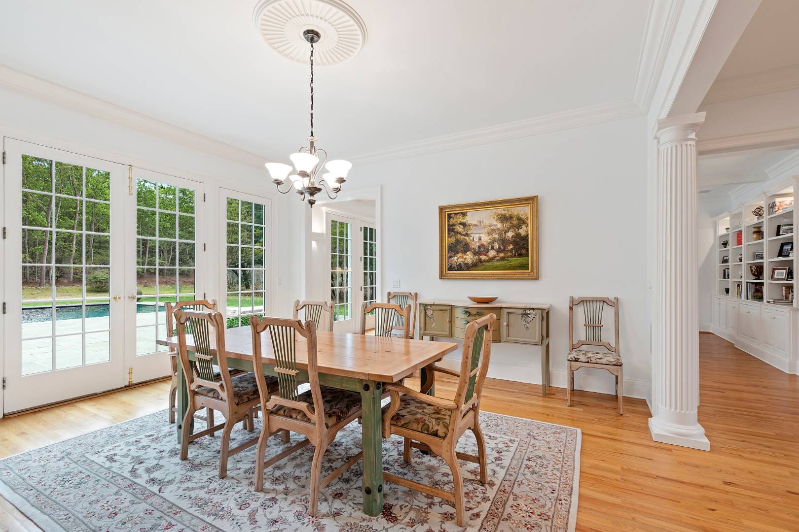 33 Cedar Trail East Hampton, NY 11937 - Photo 7 of 30 a view of a dining room with furniture window and wooden floor