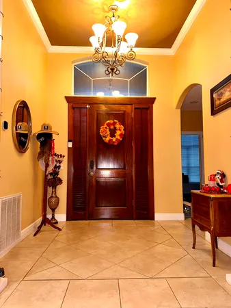 a view of a chandelier in big room