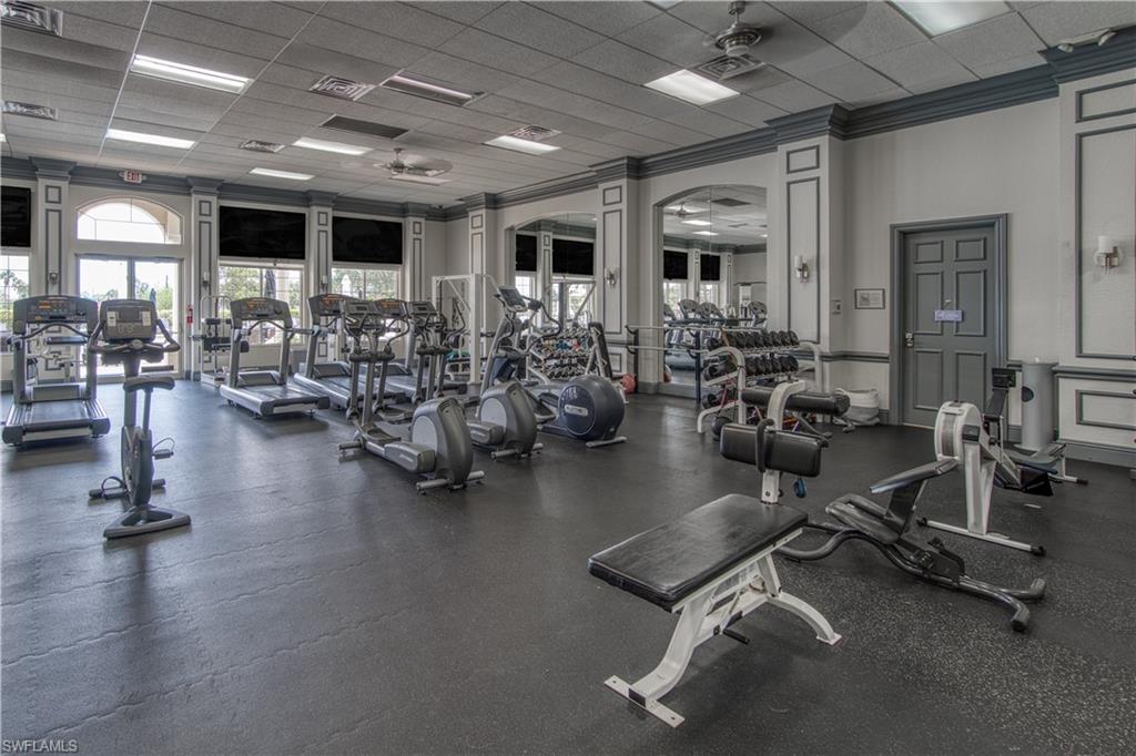 6017 Trophy Drive, Unit 603 Naples, FL 34110 - Photo 20 of 23 a view of a room with gym equipment
