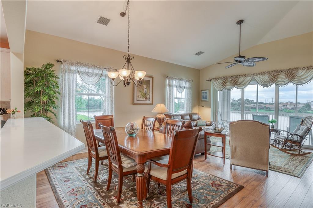 6017 Trophy Drive, Unit 603 Naples, FL 34110 - Photo 4 of 23 a view of a dining room with furniture window and outside view