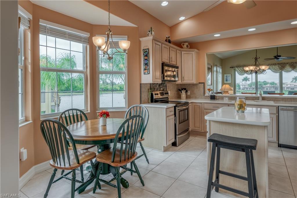 6017 Trophy Drive, Unit 603 Naples, FL 34110 - Photo 5 of 23 a view of a dining room with furniture window and outside view