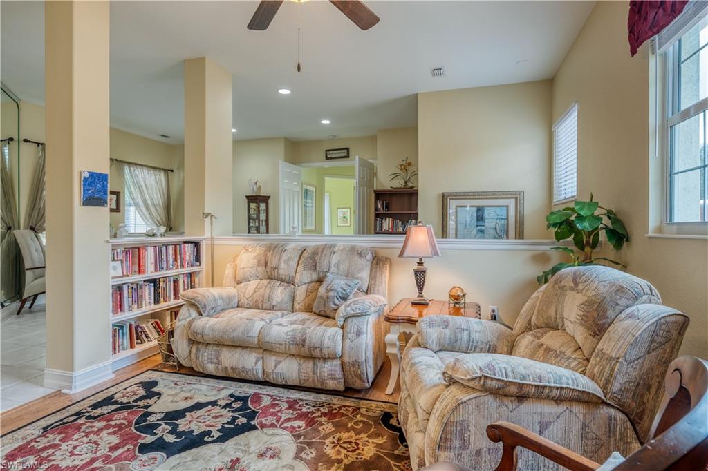 6017 Trophy Drive, Unit 603 Naples, FL 34110 - Photo 10 of 23 a living room with furniture and a couch