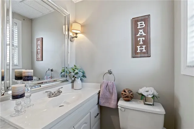 a view of walk in closet with clothes