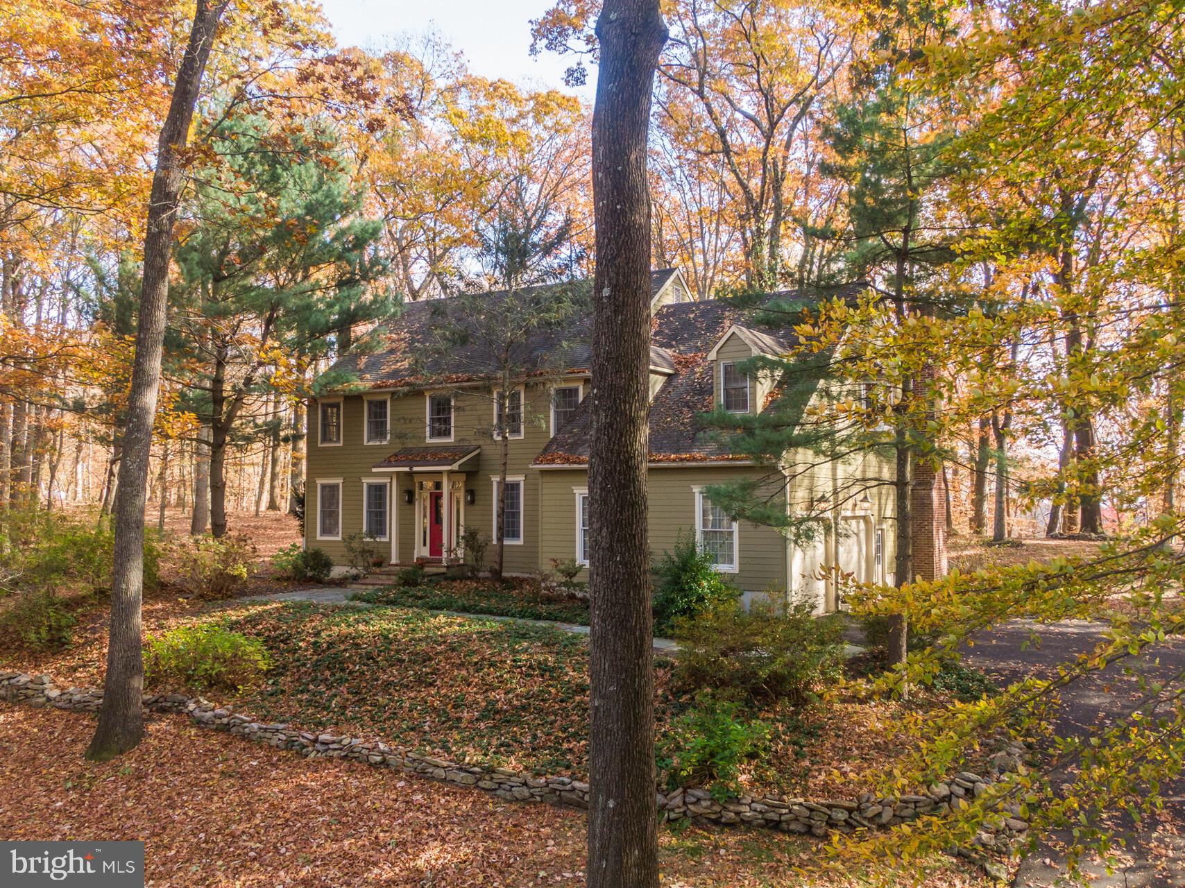 6950 Upper York Road New Hope, PA 18938 - Photo 2 of 60 a front view of a house with a yard