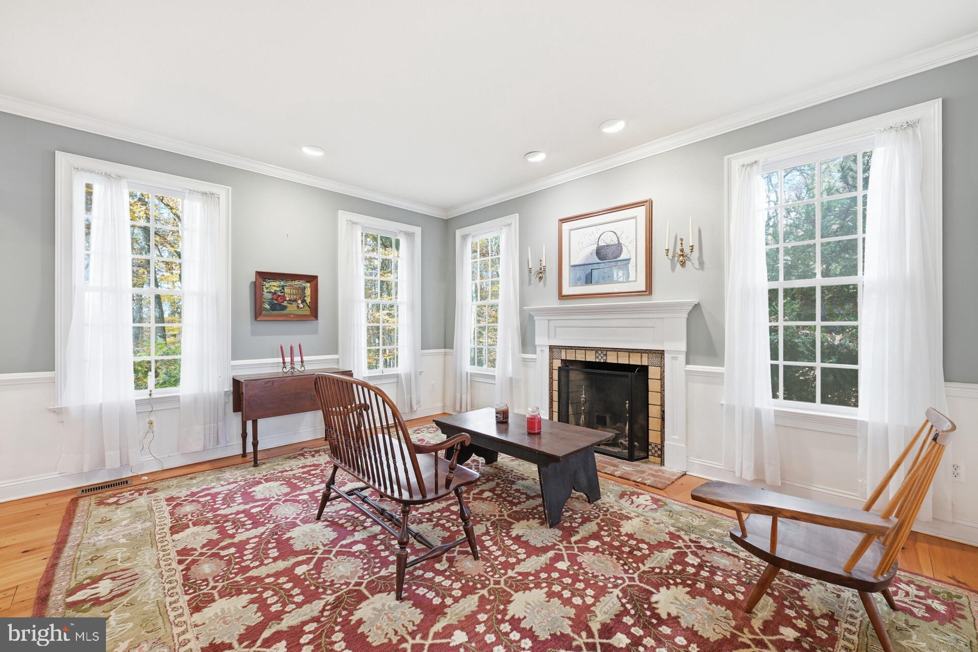 6950 Upper York Road New Hope, PA 18938 - Photo 8 of 60 a living room with furniture and a fireplace