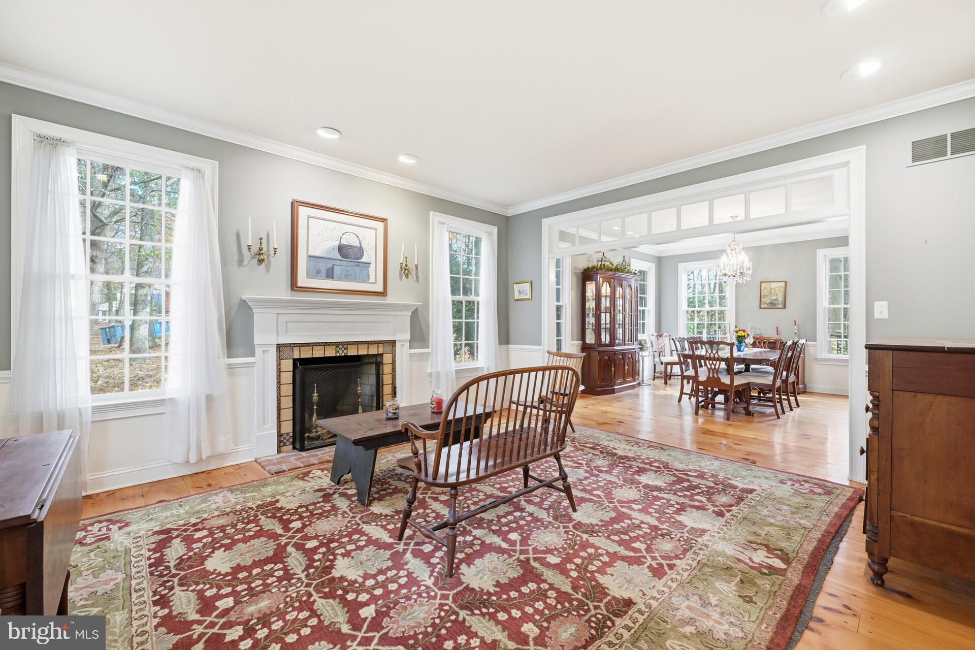 6950 Upper York Road New Hope, PA 18938 - Photo 9 of 60 a living room with furniture and a fireplace