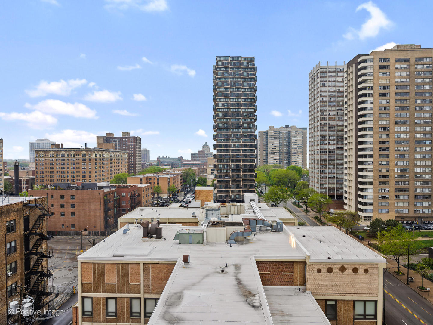 6118 North Sheridan Road, Unit 1003 Chicago, IL 60660 - Photo 9 of 13 a view of a city with tall buildings
