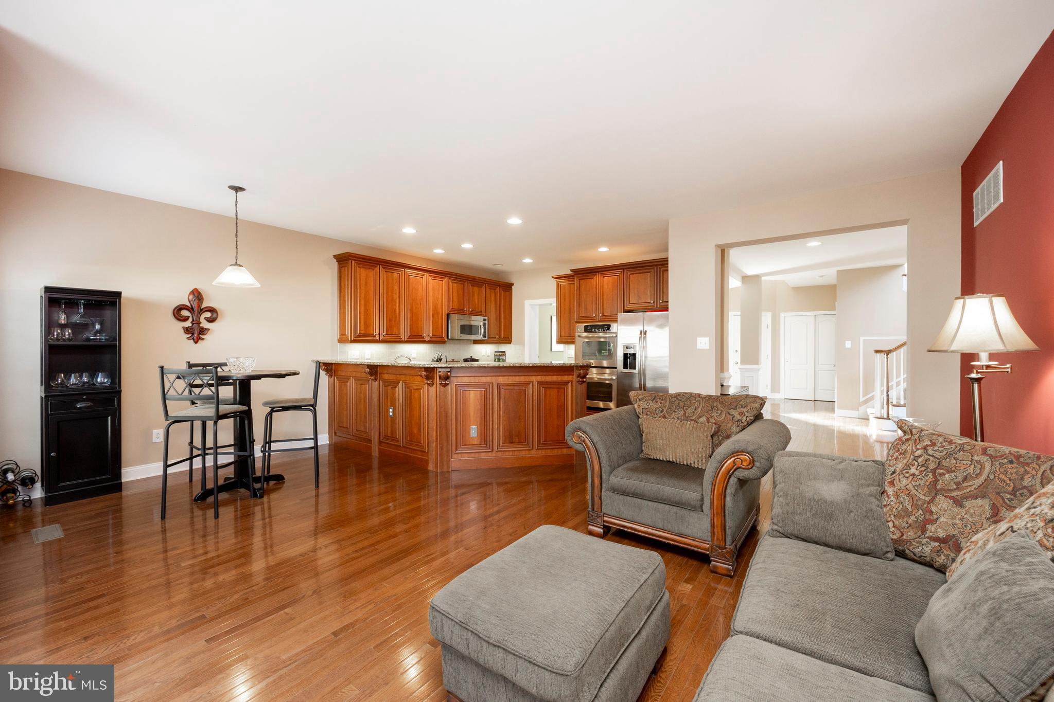 29 Ashtree Lane Malvern, PA 19355 - Photo 18 of 39 a living room with furniture wooden floor and kitchen view