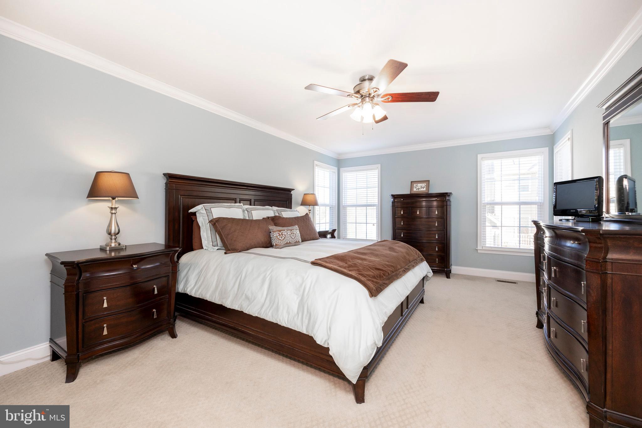 29 Ashtree Lane Malvern, PA 19355 - Photo 27 of 39 a bedroom with a bed and wooden floor