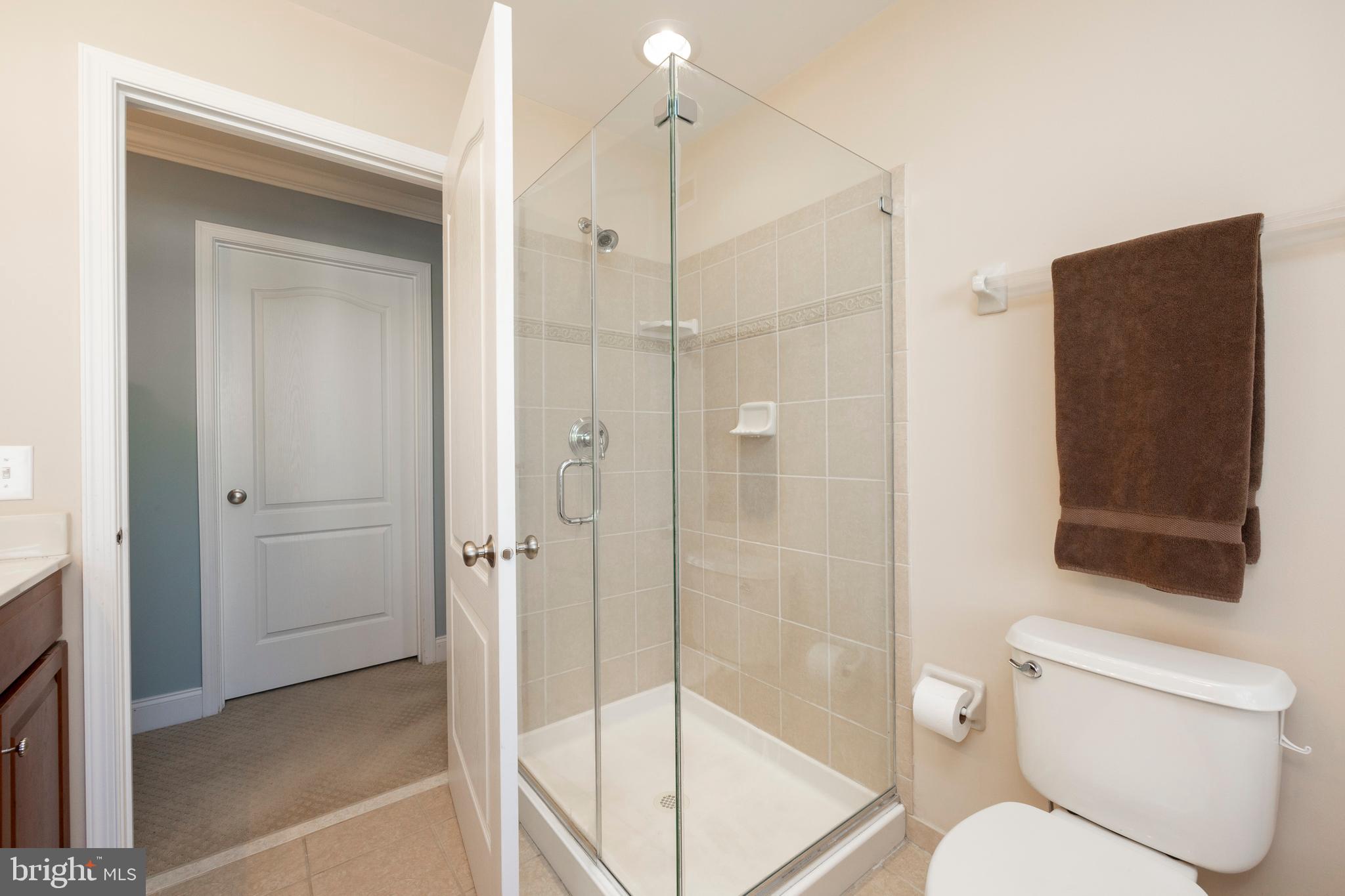 29 Ashtree Lane Malvern, PA 19355 - Photo 29 of 39 a bathroom with a shower toilet and sink