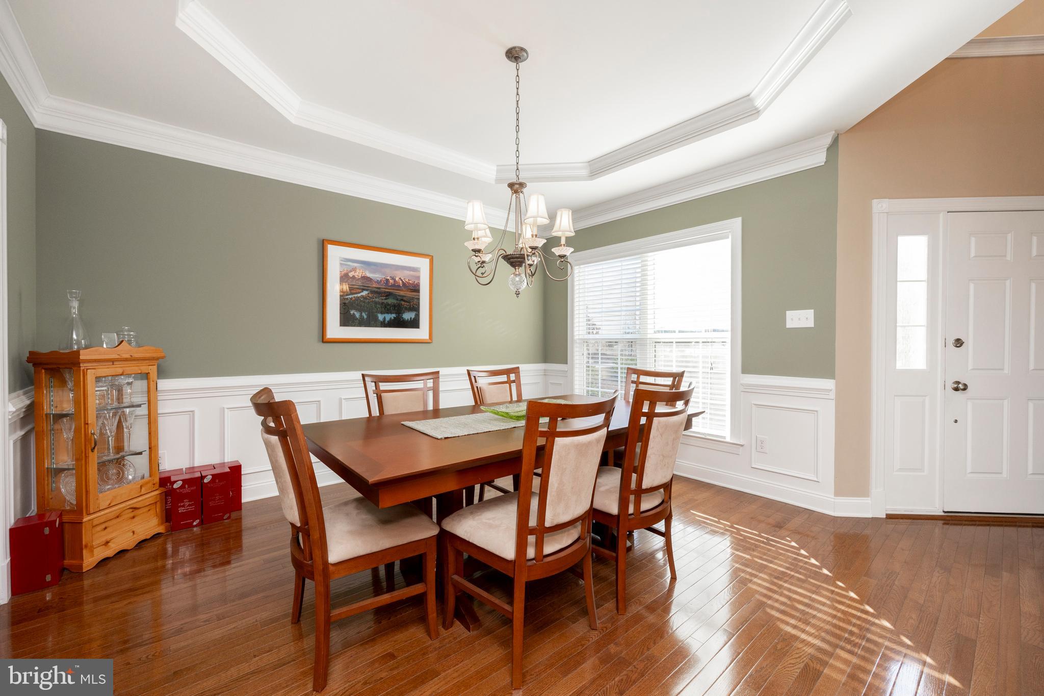 29 Ashtree Lane Malvern, PA 19355 - Photo 5 of 39 a dining room with furniture a chandelier and wooden floor