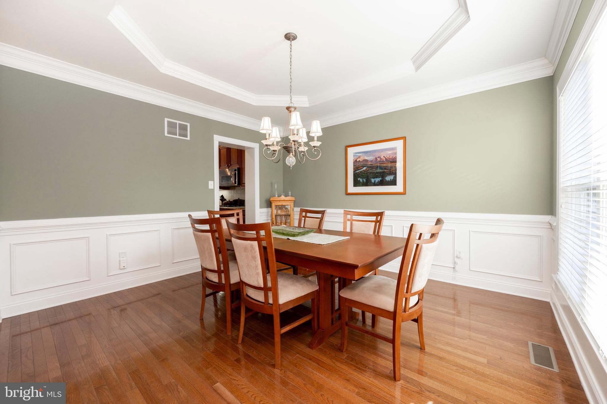 29 Ashtree Lane Malvern, PA 19355 - Photo 6 of 39 a dining room with furniture a chandelier and wooden floor