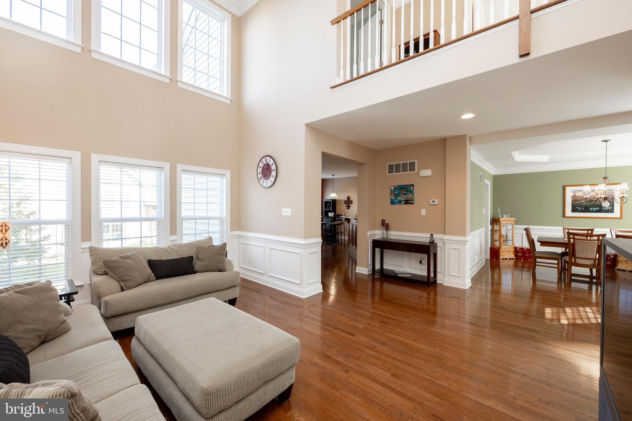 29 Ashtree Lane Malvern, PA 19355 - Photo 8 of 39 a living room with furniture and a wooden floor