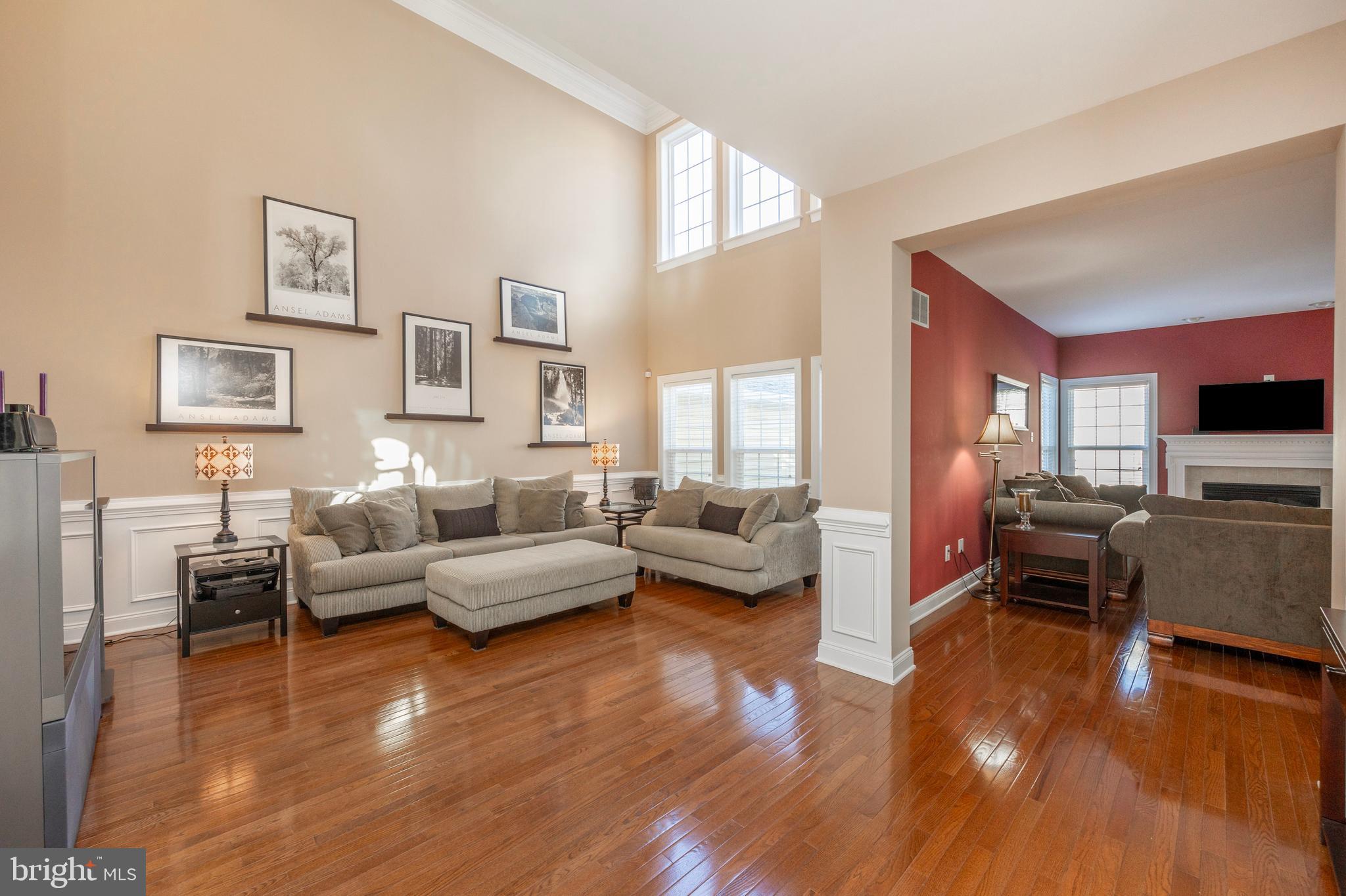 29 Ashtree Lane Malvern, PA 19355 - Photo 10 of 39 a living room with furniture and a flat screen tv