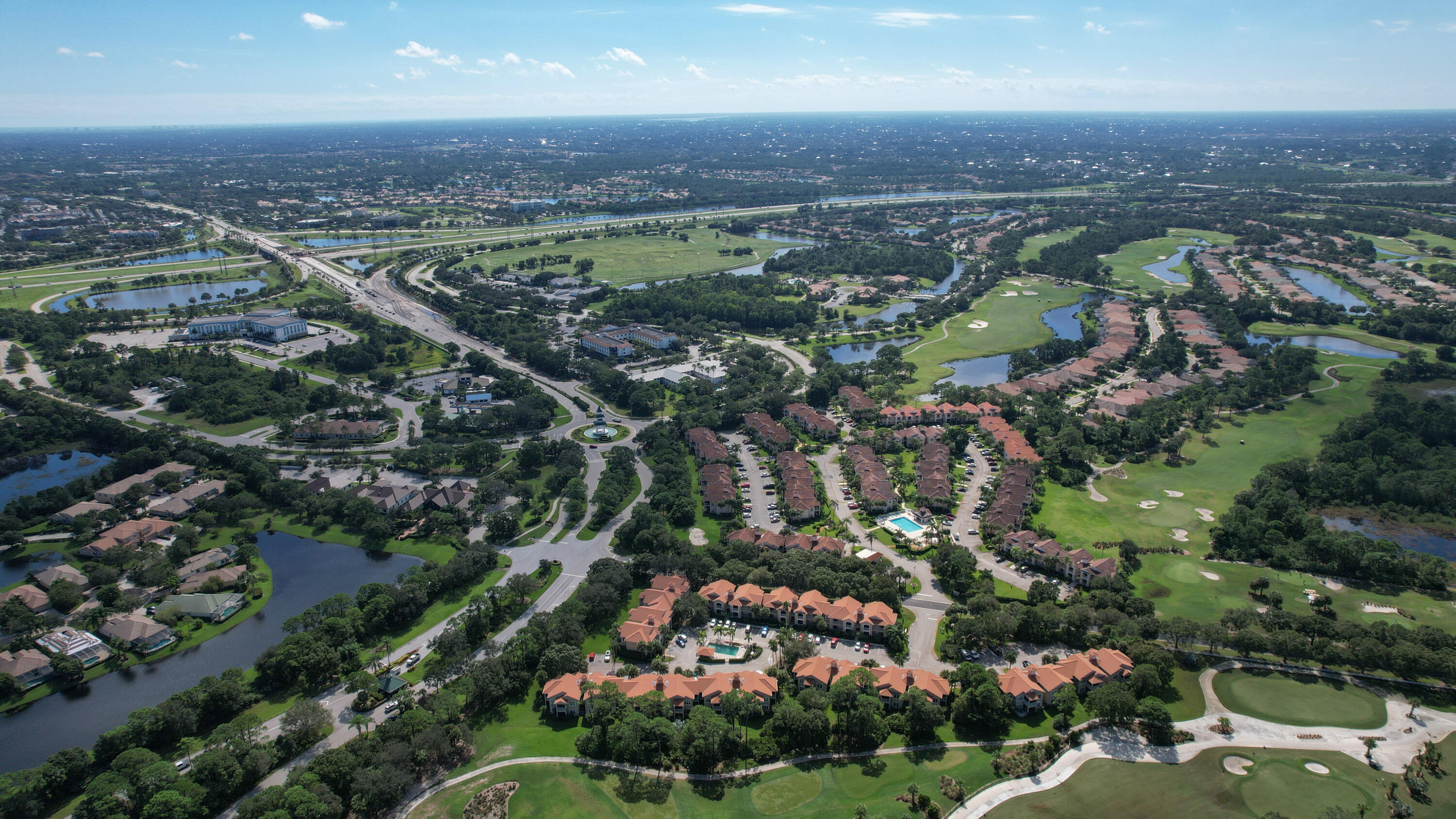 9969 Perfect Drive, Unit B Port St. Lucie, FL 34986 - Photo 5 of 8 an aerial view of a city