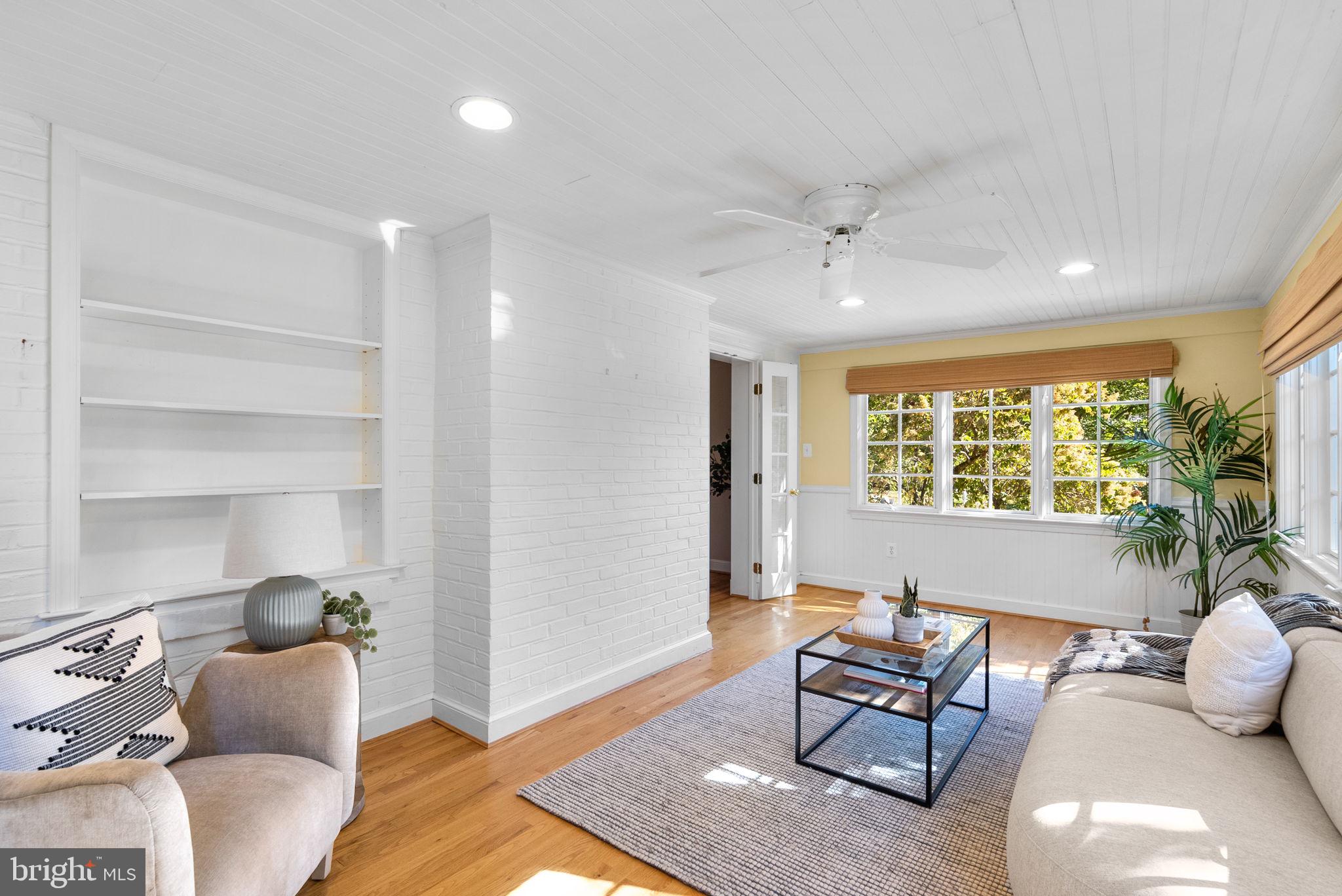 129 Lynnmoor Drive Silver Spring, MD 20901 - Photo 11 of 48 a living room with furniture and a large window
