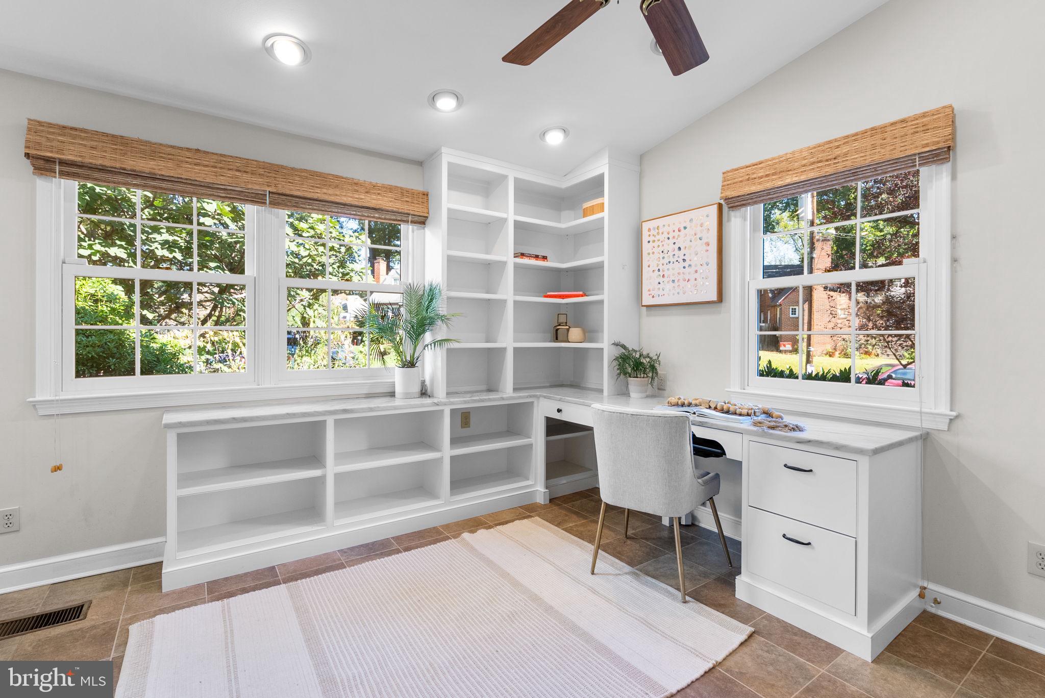 129 Lynnmoor Drive Silver Spring, MD 20901 - Photo 19 of 48 a view of a workspace with furniture and a window
