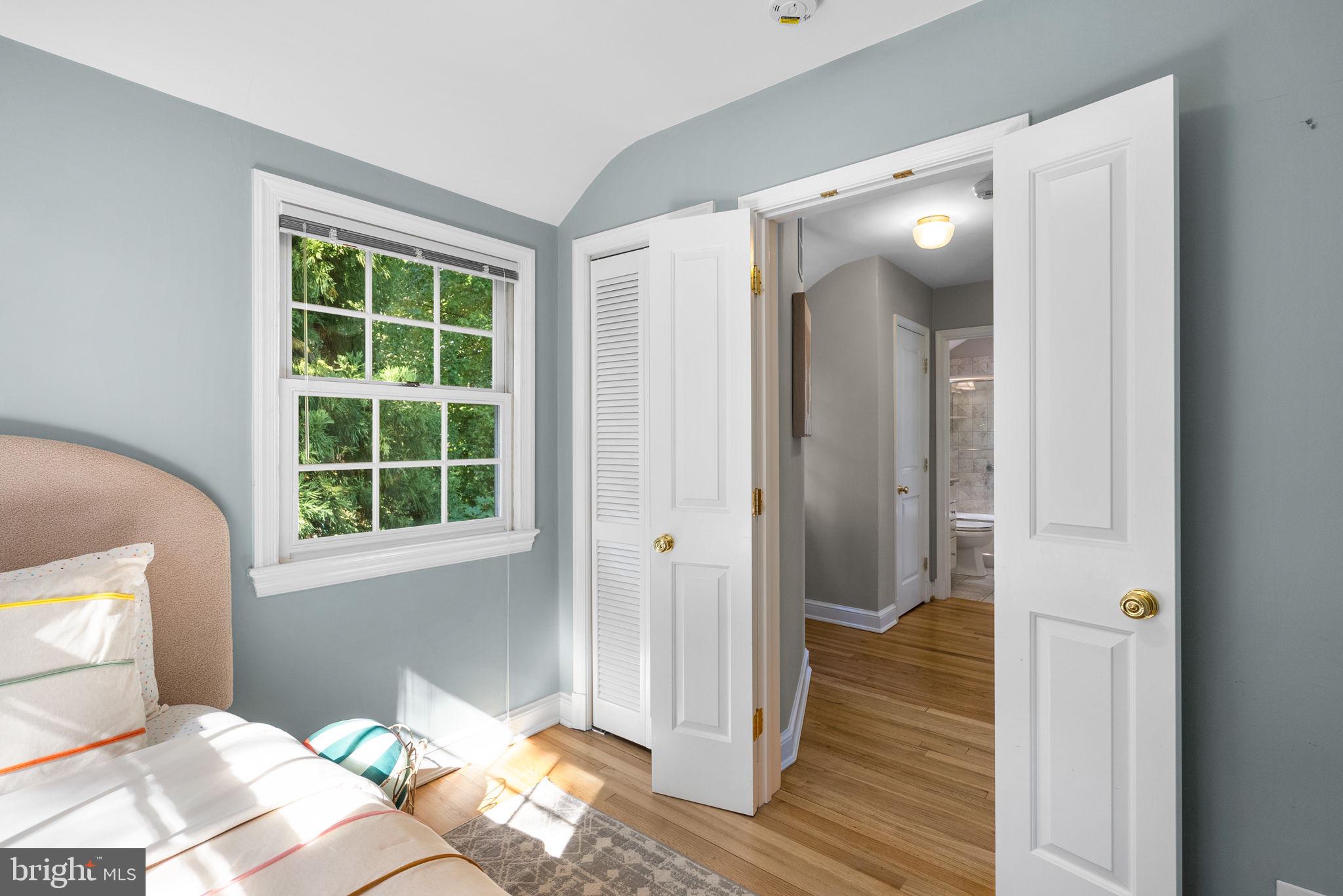 129 Lynnmoor Drive Silver Spring, MD 20901 - Photo 25 of 48 a bedroom with a bed and wooden floor