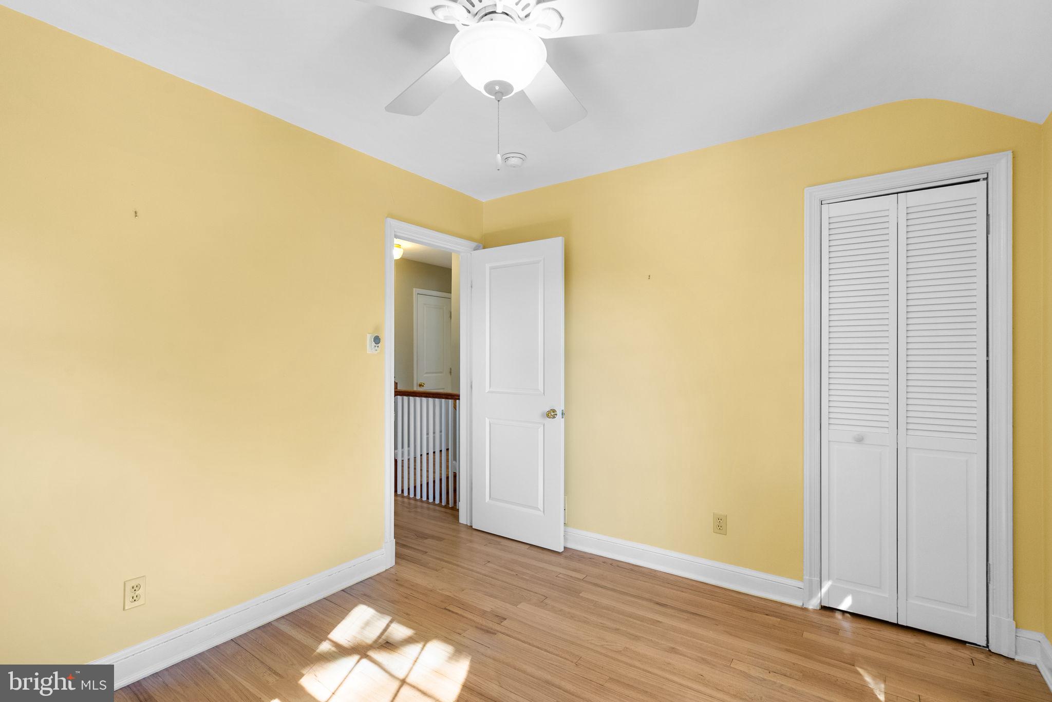 129 Lynnmoor Drive Silver Spring, MD 20901 - Photo 27 of 48 a view of livingroom with hardwood floor and a ceiling fan