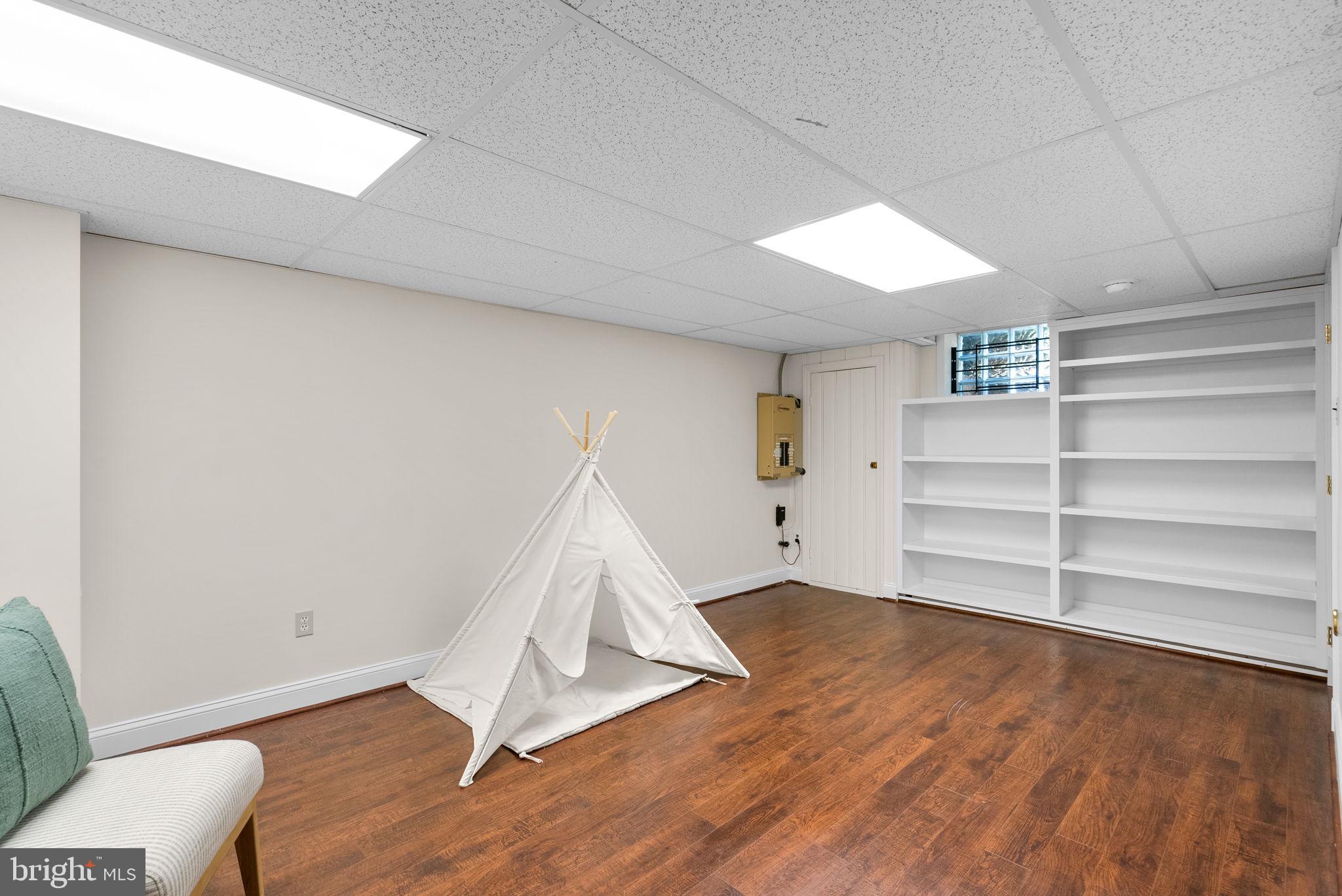 129 Lynnmoor Drive Silver Spring, MD 20901 - Photo 32 of 48 a view of a room with wooden floor and cabinet