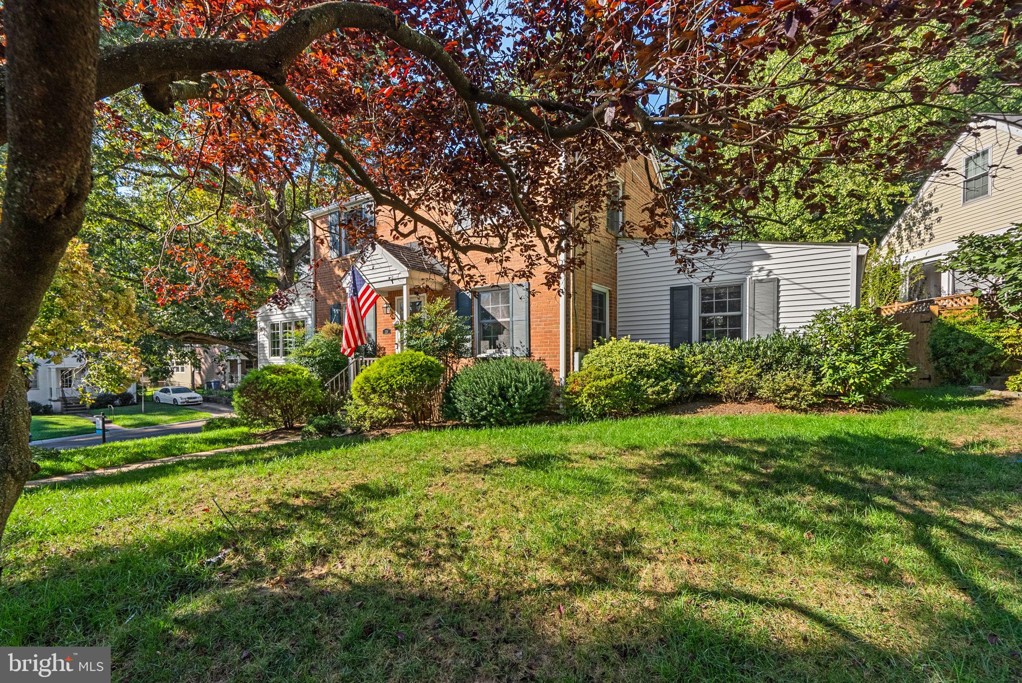 129 Lynnmoor Drive Silver Spring, MD 20901 - Photo 4 of 48 a house view with a garden and trees