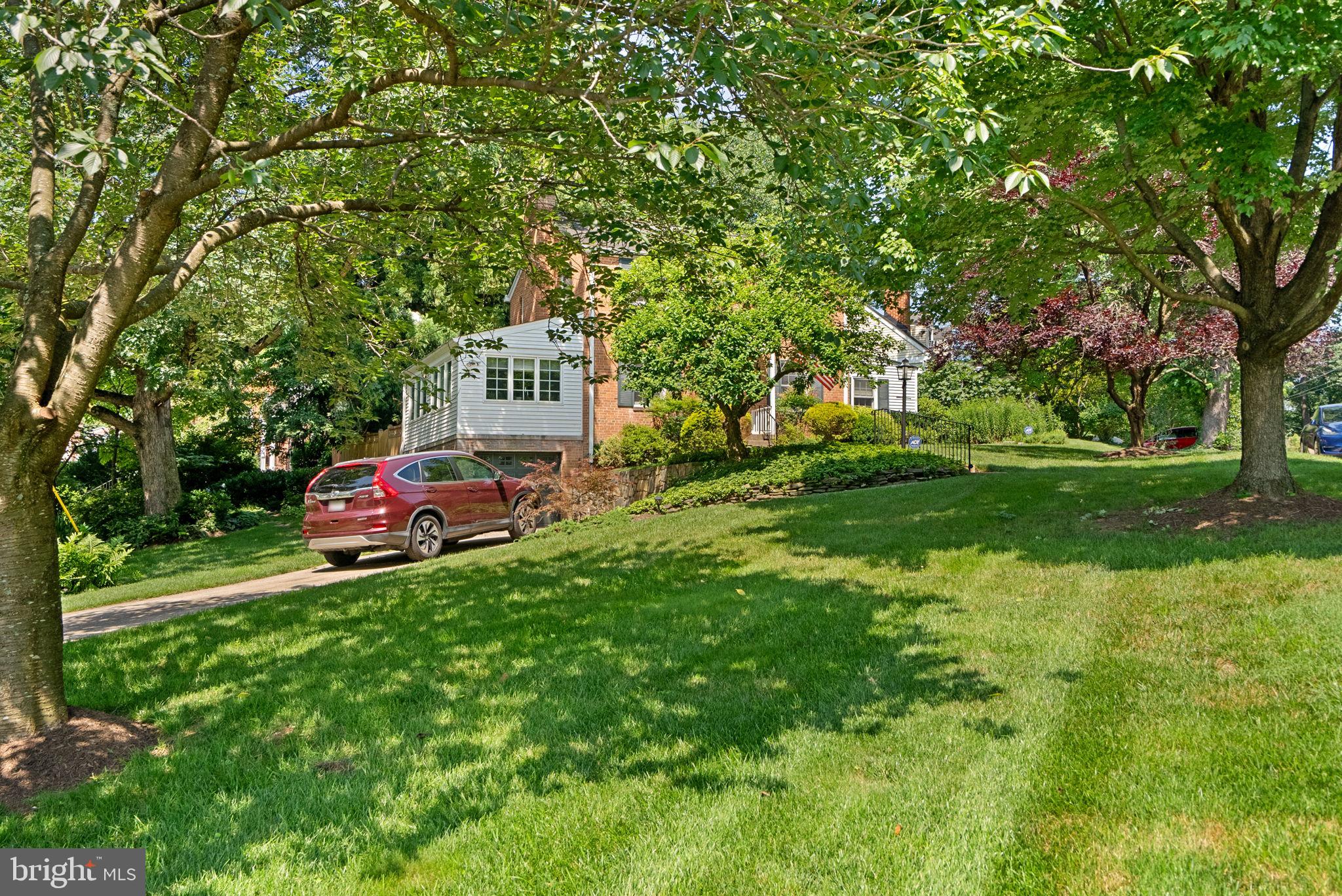 129 Lynnmoor Drive Silver Spring, MD 20901 - Photo 42 of 48 a front view of a house with a garden