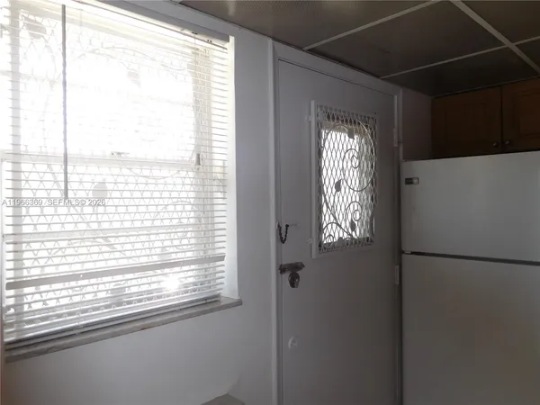 a view of empty room with a window