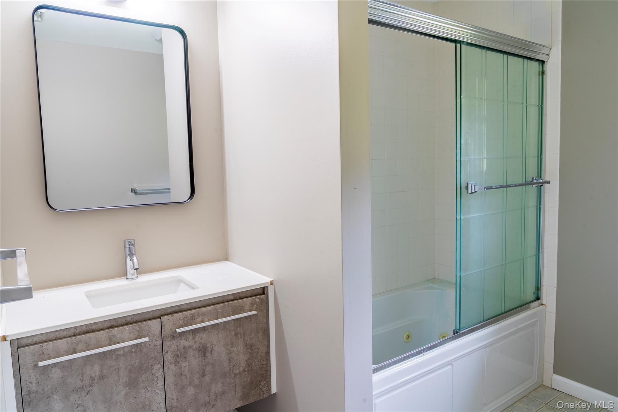 376 Wade Road Liberty, NY 12754 - Photo 9 of 26 Full bath with shower / bath combination with glass door and vanity