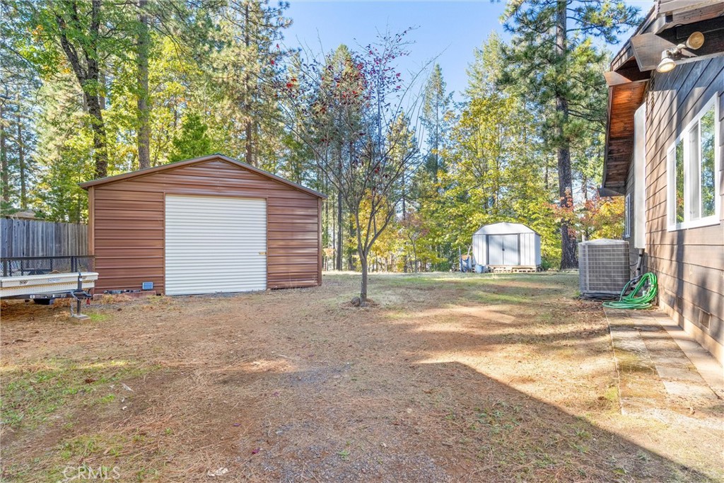 16298 Forest Ranch Road Forest Ranch, CA 95942 - Photo 11 of 67 a view of a house with a yard and garage
