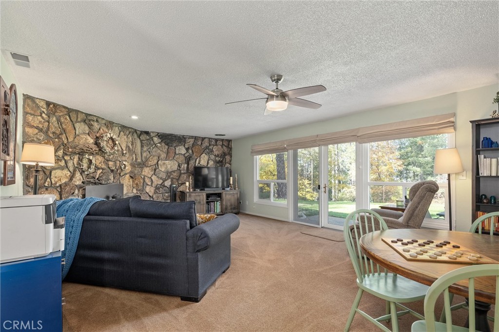16298 Forest Ranch Road Forest Ranch, CA 95942 - Photo 15 of 67 a living room with furniture and a large window