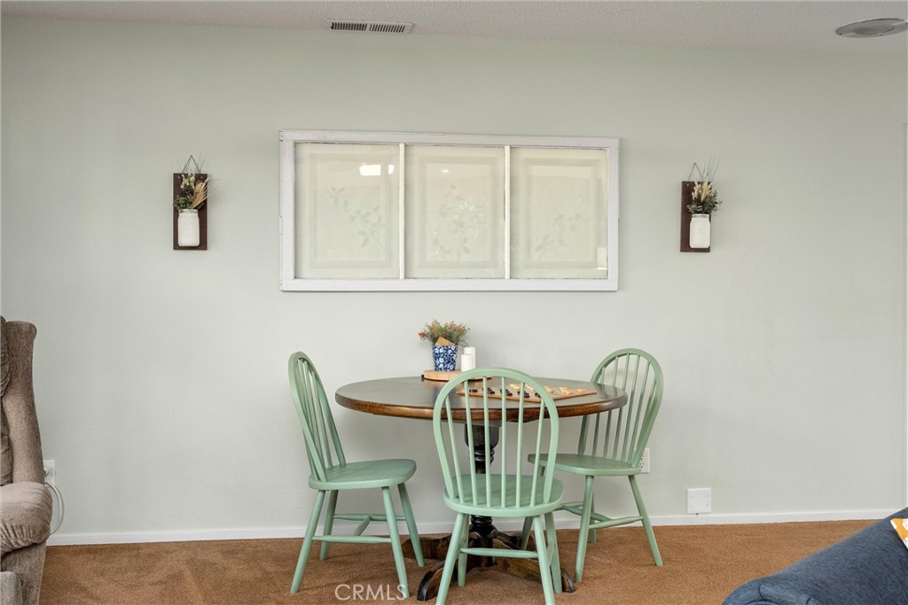 16298 Forest Ranch Road Forest Ranch, CA 95942 - Photo 18 of 67 a view of a dining room with furniture and wooden floor
