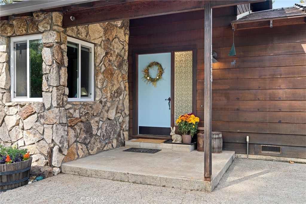 16298 Forest Ranch Road Forest Ranch, CA 95942 - Photo 2 of 67 a front view of a house with outdoor seating