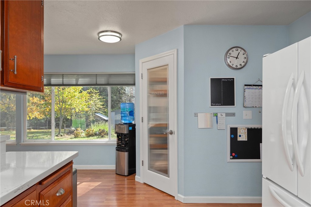 16298 Forest Ranch Road Forest Ranch, CA 95942 - Photo 22 of 67 a view of an entryway with wooden floor and a window