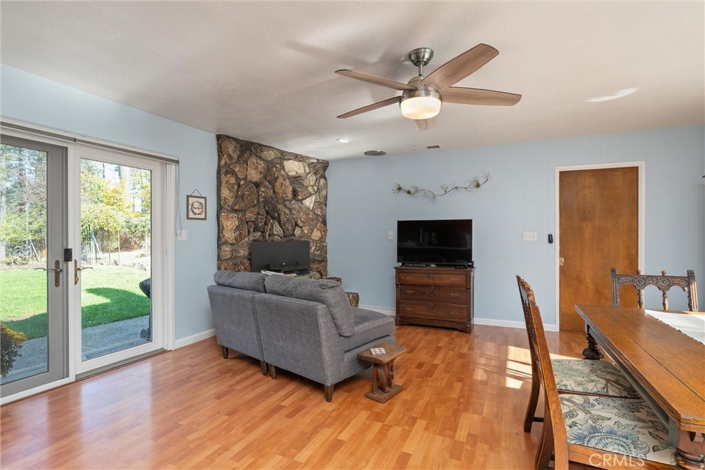 16298 Forest Ranch Road Forest Ranch, CA 95942 - Photo 25 of 67 a living room with furniture and a fireplace